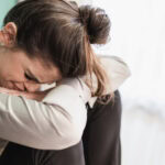 Woman experiencing a mental health crisis