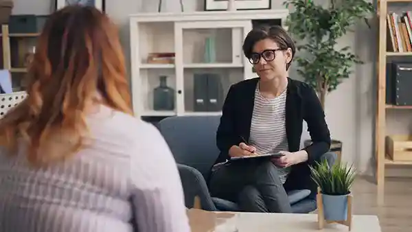 Addictions and substance use treatment provider in office setting.